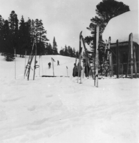 1940s The base area beside a snow-loaded timber building