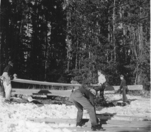 1940s Work party carrying sawn timber