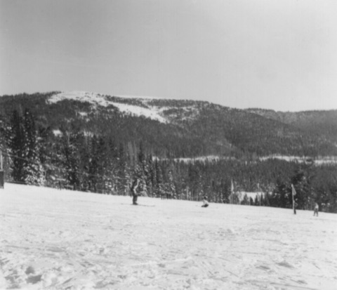 1940s-50s Practice slope with course flags and a tow line