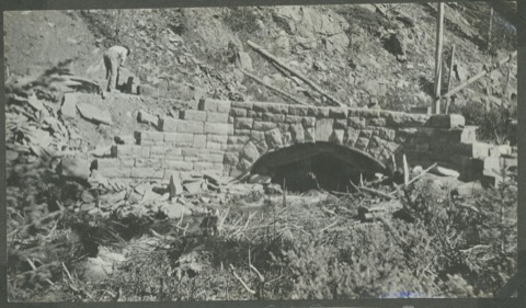 1916 Neihart Road, the stone bridge at Sta. 30 under construction